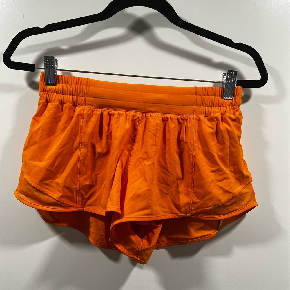 Orange Lululemon shorts